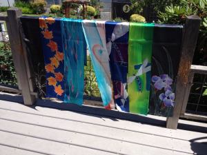 Various scarves5us in black, Falling Leaves, Aqua Motion, Breath, Dragonfly in blue, Dragonfly in green